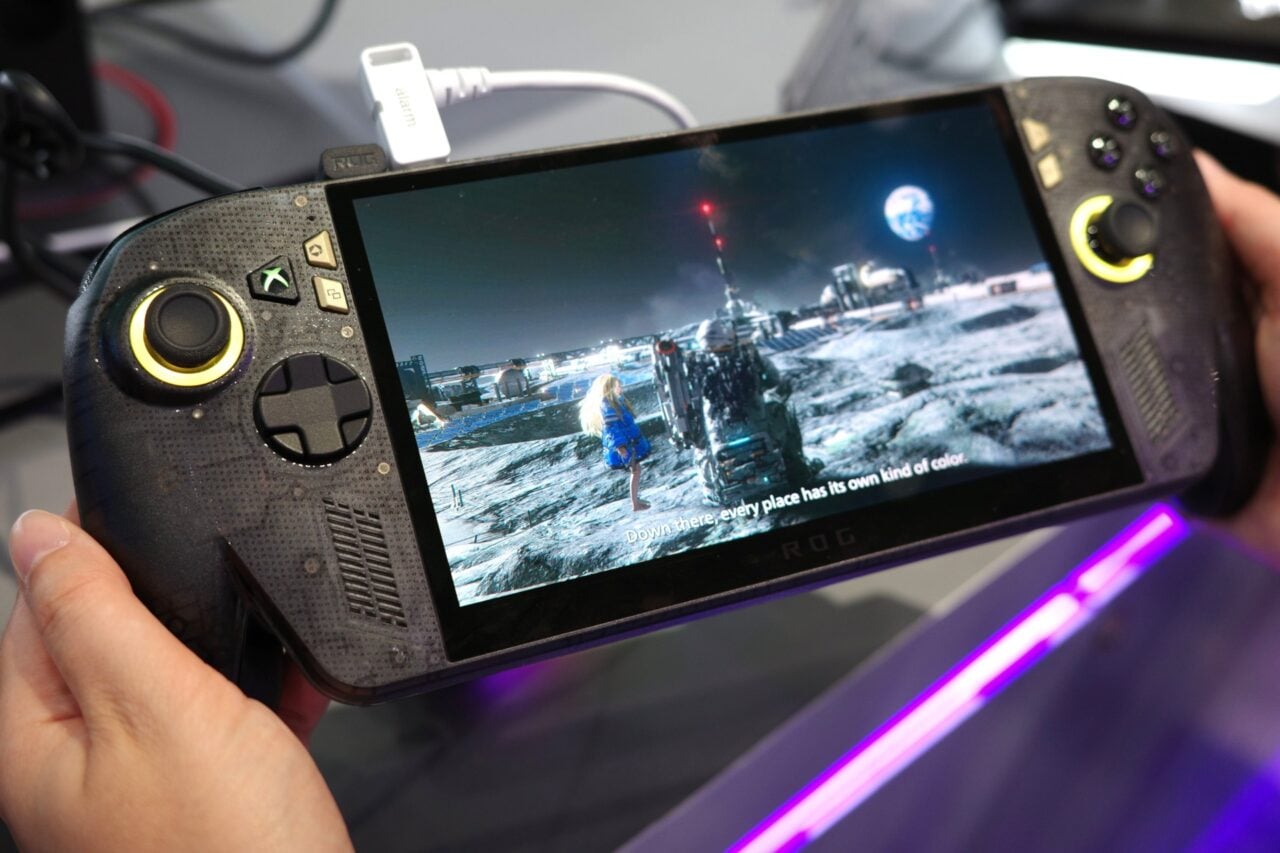 Asus Rog Xbox Ally X20 being held in hand showing a scene from Pragmata
